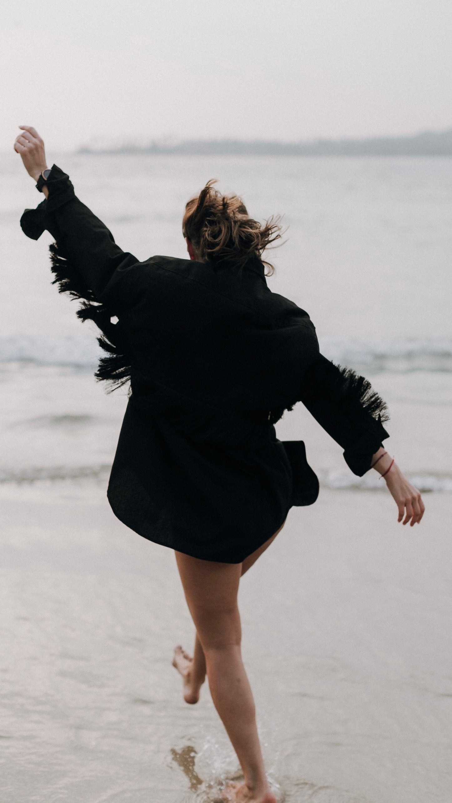 Oversized shirt with tassels